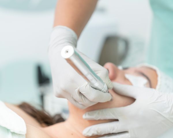 A facial treatment underway at Aura, a beauty salon demo